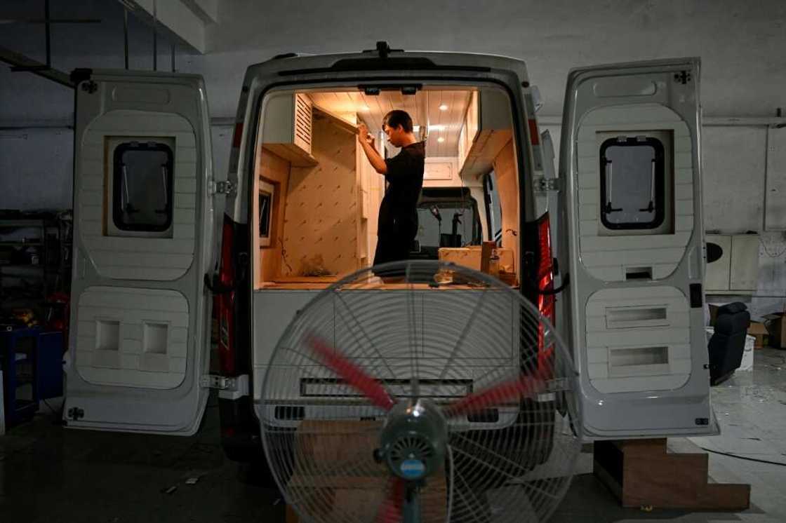 Zhang and his wife hope to put the money saved towards a down payment for a flat in a lower-tier city Zhang and his wife hope to put the money saved towards a down payment for a flat in a lower-tier city