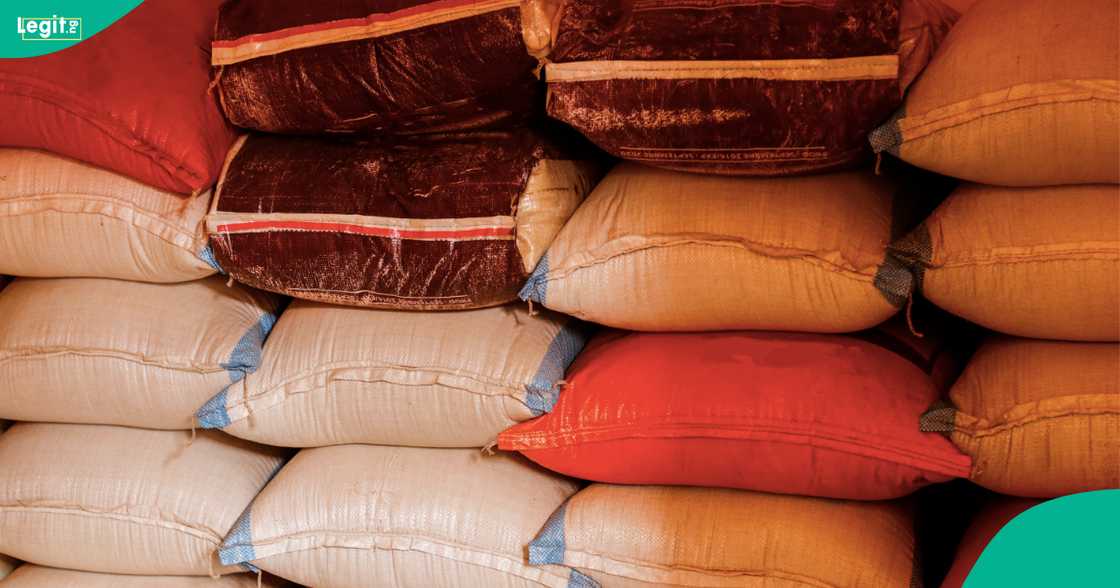 A businesswoman breaks down in tears after her bags of rice were stolen from her shop. A businesswoman breaks down in tears after her bags of rice were stolen from her shop.