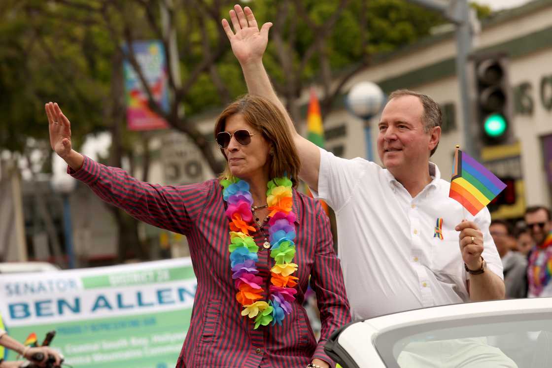 Adam Schiff and his wife Eve, process down Santa Monica Blvd. while showing their support for the gay community during the WeHo Pride Parade in West Hollywood Adam Schiff and his wife Eve, process down Santa Monica Blvd. while showing their support for the gay community during the WeHo Pride Parade in West Hollywood