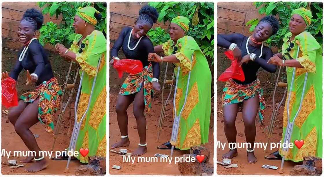 Photos shows a Nigerian lady dancing for her mother.