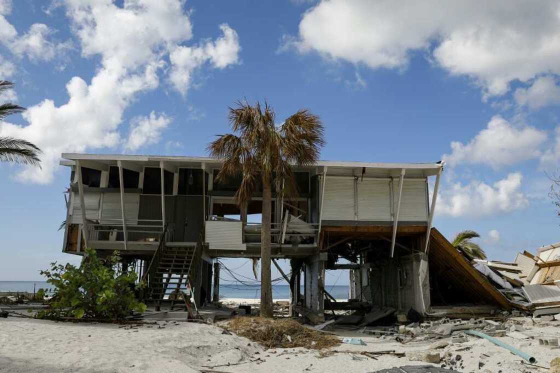 A wrecked beach house awaits reconstruction at Bonita Beach, Florida A wrecked beach house awaits reconstruction at Bonita Beach, Florida