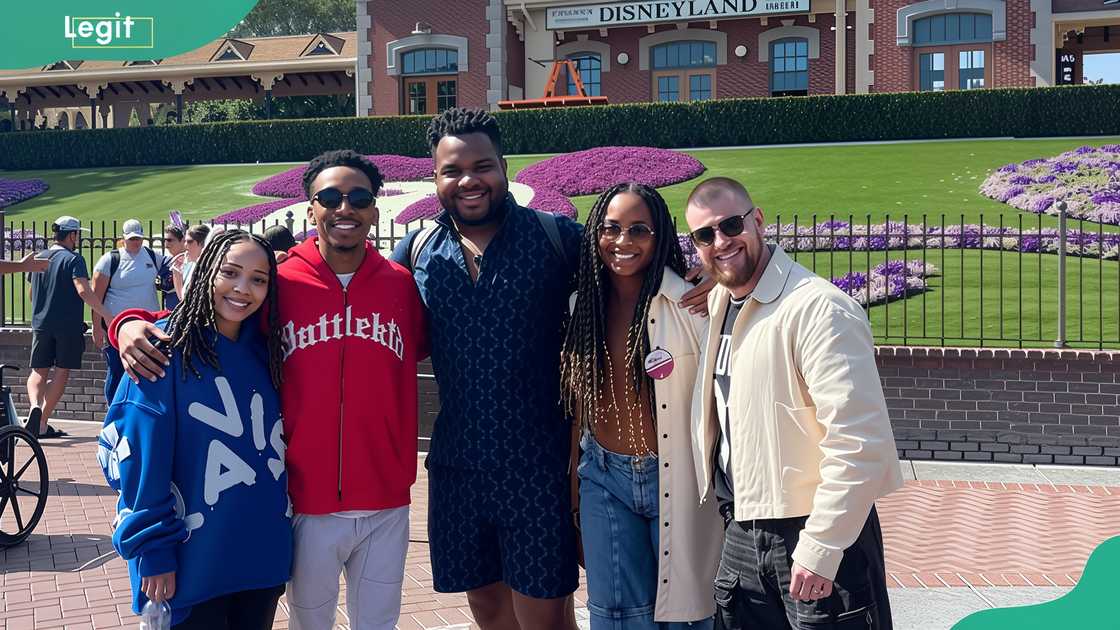 Ren Taylor Roberts (second from right) enjoys a moment with her siblings and husband (right) Ren Taylor Roberts (second from right) enjoys a moment with her siblings and husband (right)