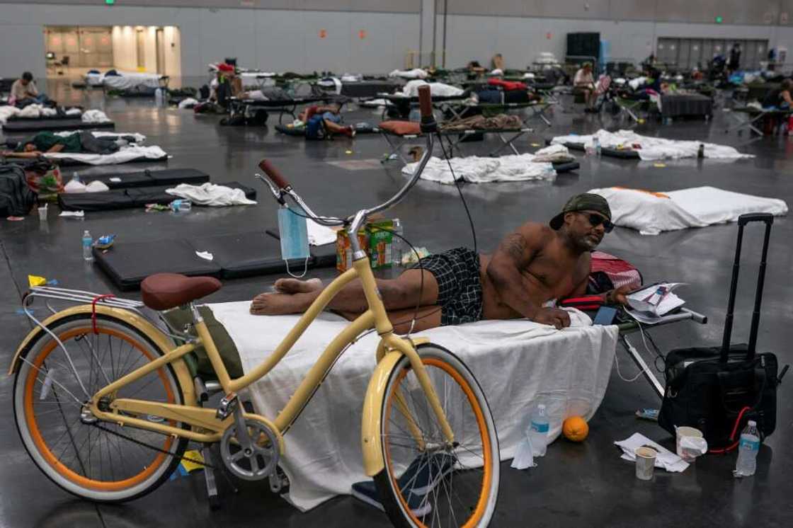 Kermic Luster rests in a cooling center at the Oregon Convention Center on June 27, 2021 in Portland, Oregon