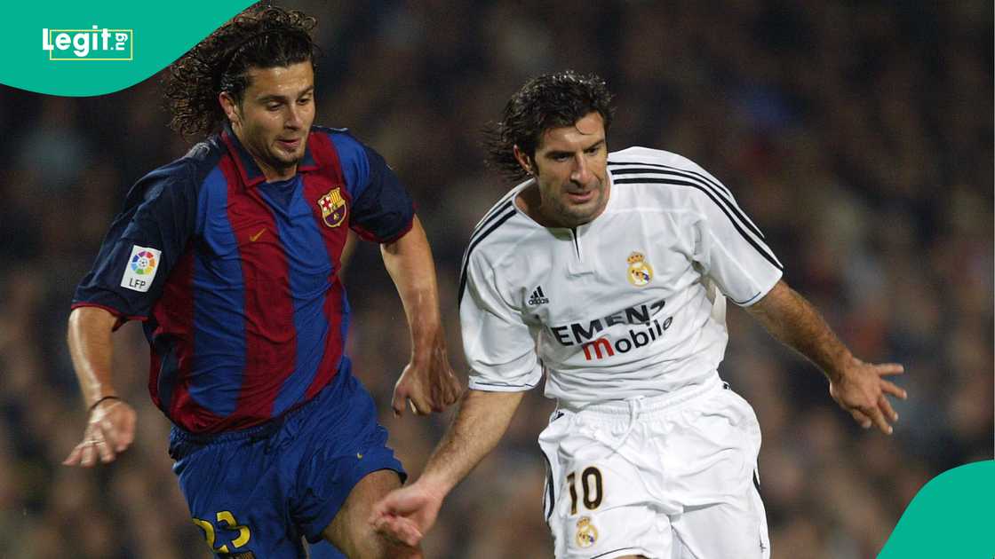 Luis Figo of Real Madrid is challenged by Thiago Motta during El Clásico at Nou Camp in 2003. Photo by Shaun Botterill