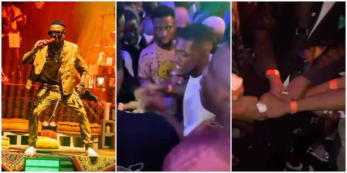 Men burn and share Wizkid's sweaty towel after catching it during his performance in Warri, video stirs reactions Men burn and share Wizkid's sweaty towel after catching it during his performance in Warri, video stirs reactions