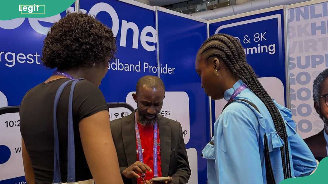 Clients being help by a FiberOne staff Clients being help by a FiberOne staff