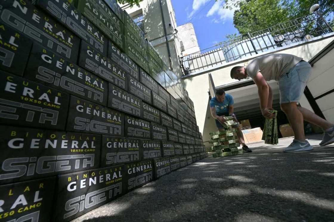 Employees prepare boxes with equipment to send to Ukrainian army, outside the office of Serhiy Prytula foundation in Kyiv Employees prepare boxes with equipment to send to Ukrainian army, outside the office of Serhiy Prytula foundation in Kyiv
