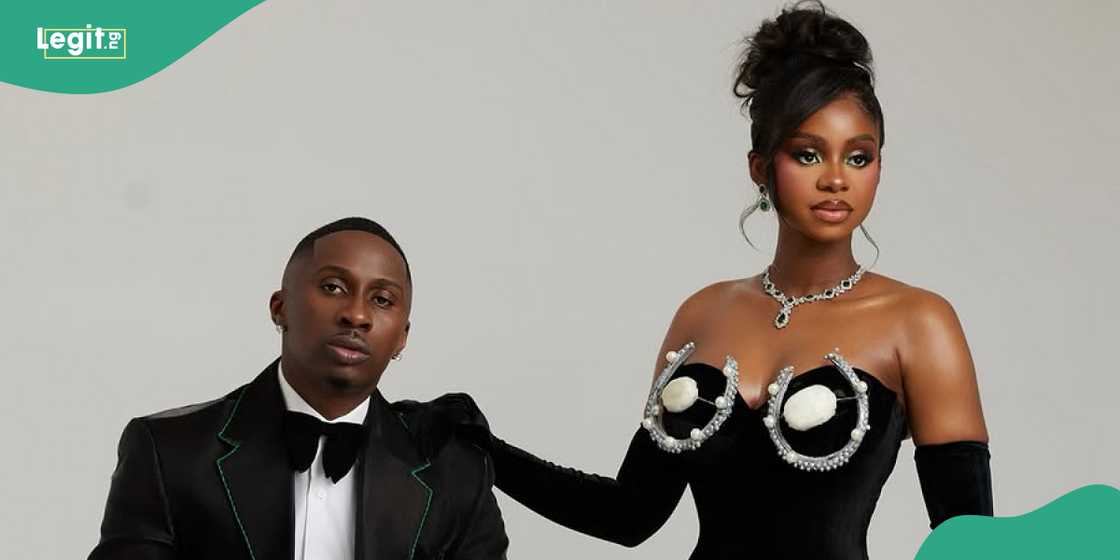 Juma Jux and Priscilla walk holding hands. Juma Jux and Priscilla walk holding hands.