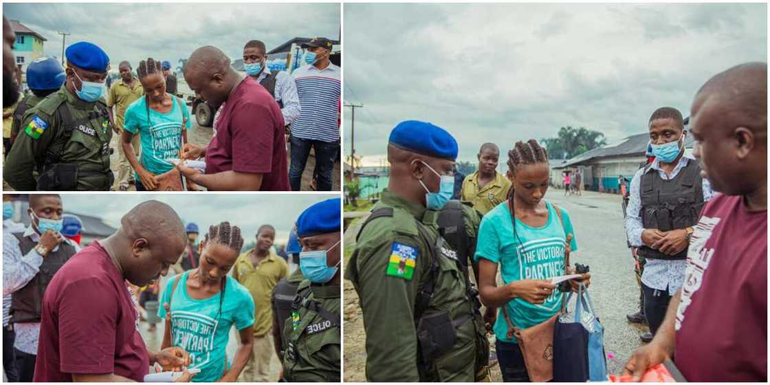 Reactions as Nigerian man surprises lady N500k for her calmness after his car mistakenly splashed water on her