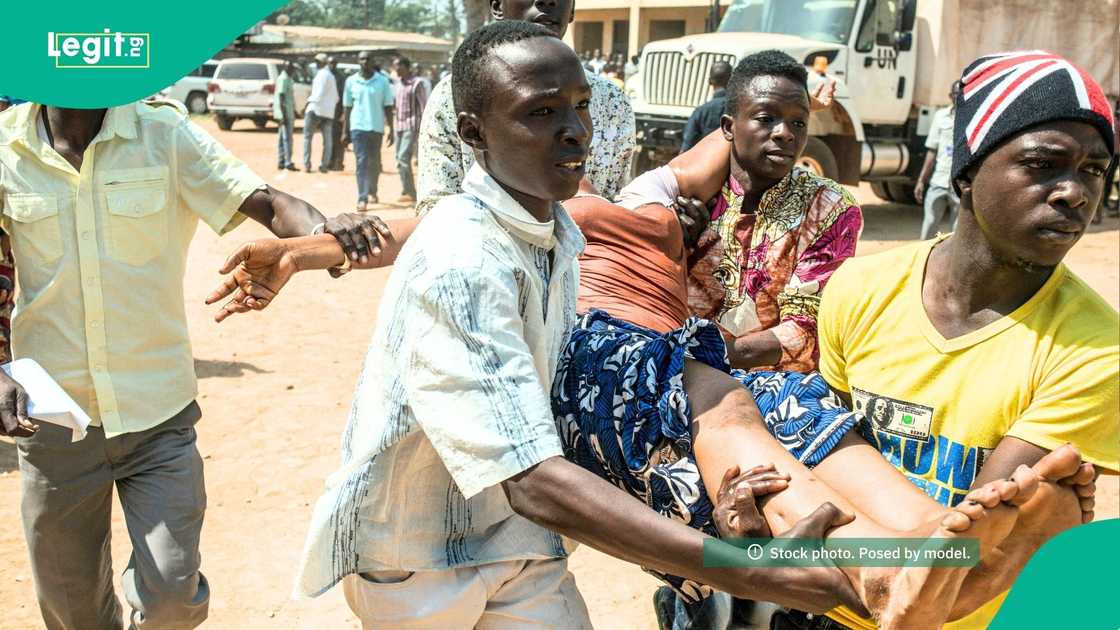 Kwara court officials attend to a woman, Mulikat Yusuf, as she faints during proceedings after her husband, Ishaq Abdulganiyu, demands a divorce. Kwara court officials attend to a woman, Mulikat Yusuf, as she faints during proceedings after her husband, Ishaq Abdulganiyu, demands a divorce.