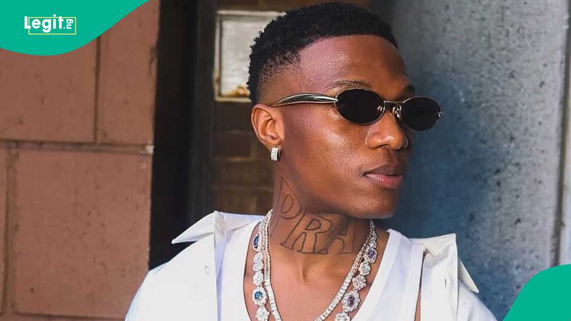 Wizkid trends for kicking a fan's phone during a recent concert. Wizkid trends for kicking a fan's phone during a recent concert.