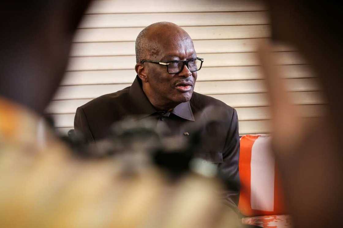 Kabore speaking at a press conference at his home in Ouagadougou last month. Supporters gathered outside to prevent him from attending a summit of ex-presidents organised by the junta