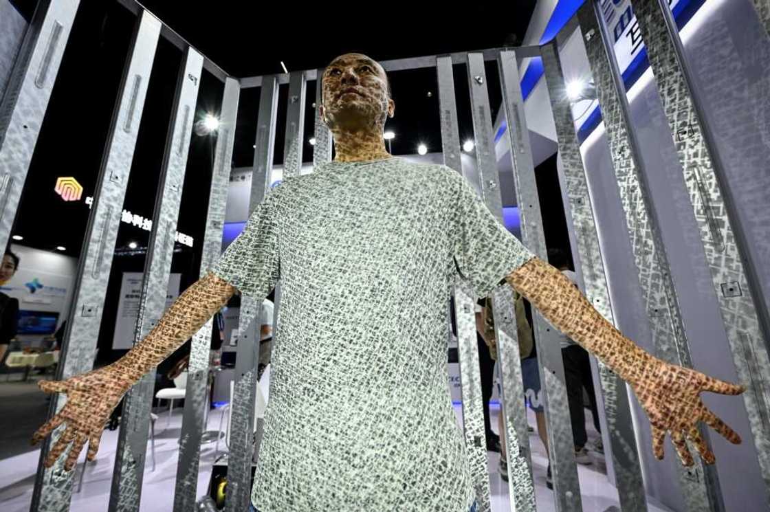 A man is scanned to create his avatar during the World Metaverse Conference in Beijing on August 26, 2022