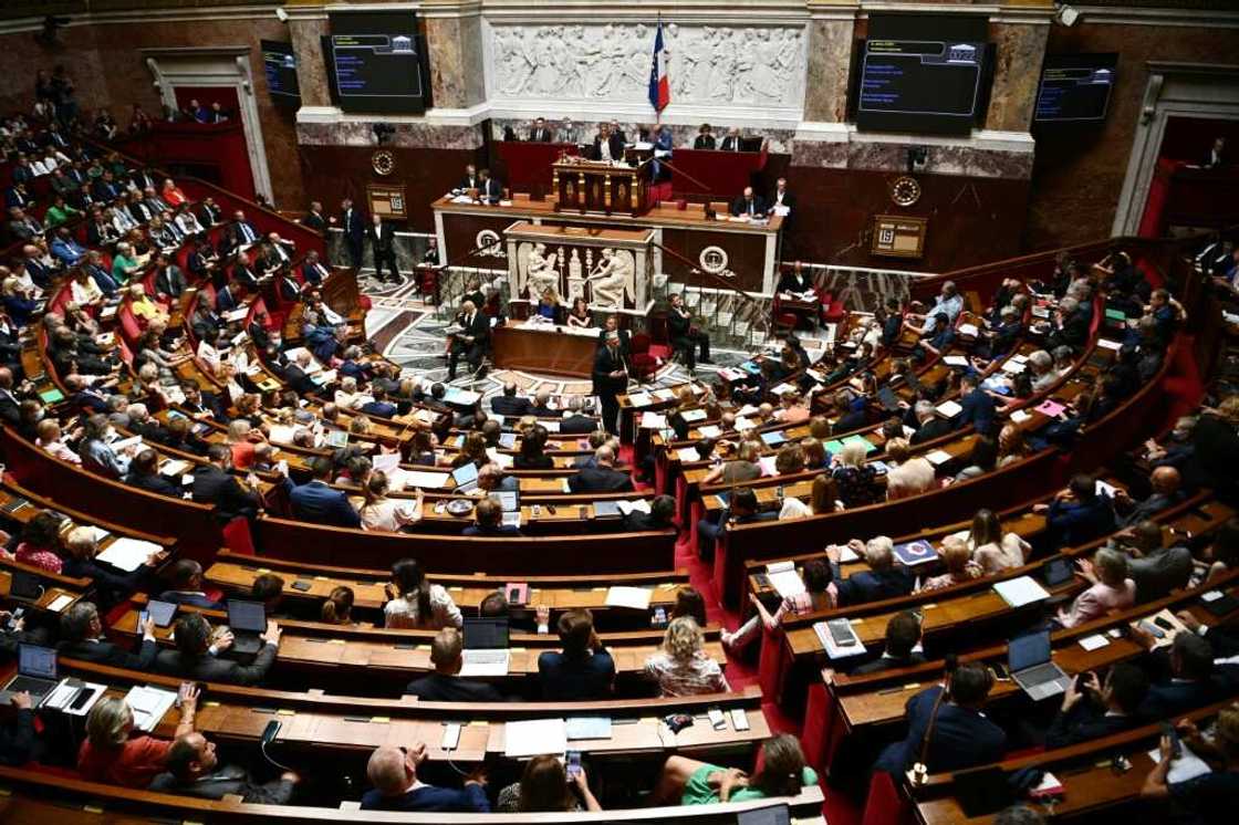 Elections last month delivered a hung parliament, but most French people are happy with it, surveys show Elections last month delivered a hung parliament, but most French people are happy with it, surveys show