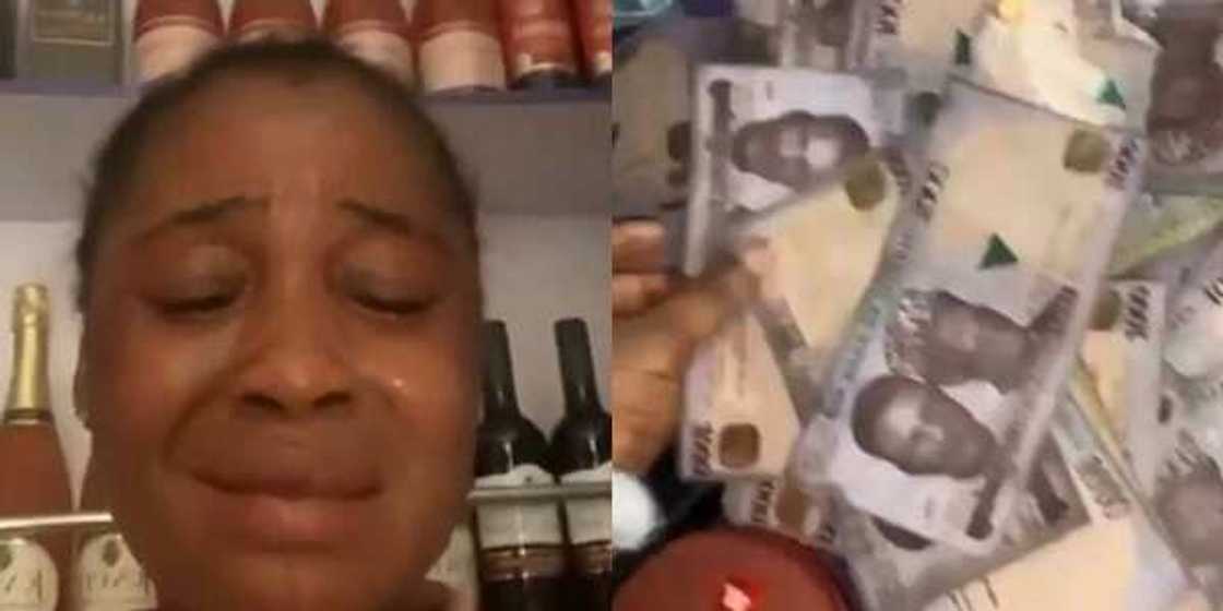 Lagos Lady in Tears after Someone Used Fake Naira Notes to Buy Drinks Worth N200k from her Lagos Lady in Tears after Someone Used Fake Naira Notes to Buy Drinks Worth N200k from her