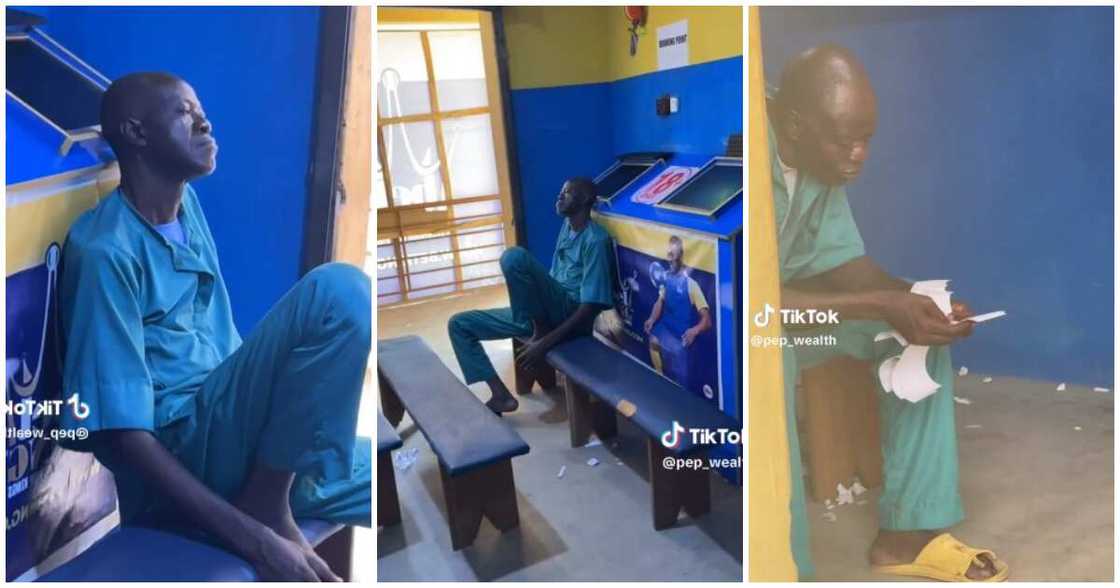 Chelsea, bet center, man looks at his ticket Chelsea, bet center, man looks at his ticket