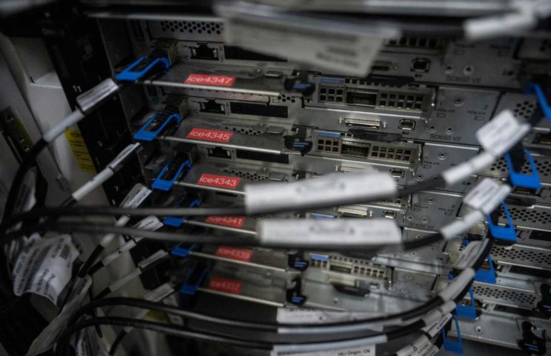 A cabinet holding racks and active servers