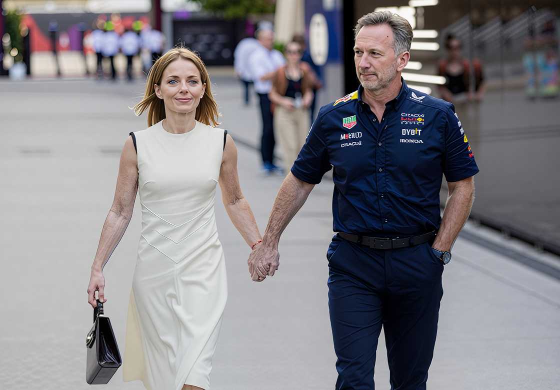Geri Halliwell and Christian Horner holding hands as they walk at Bahrain International Circuit