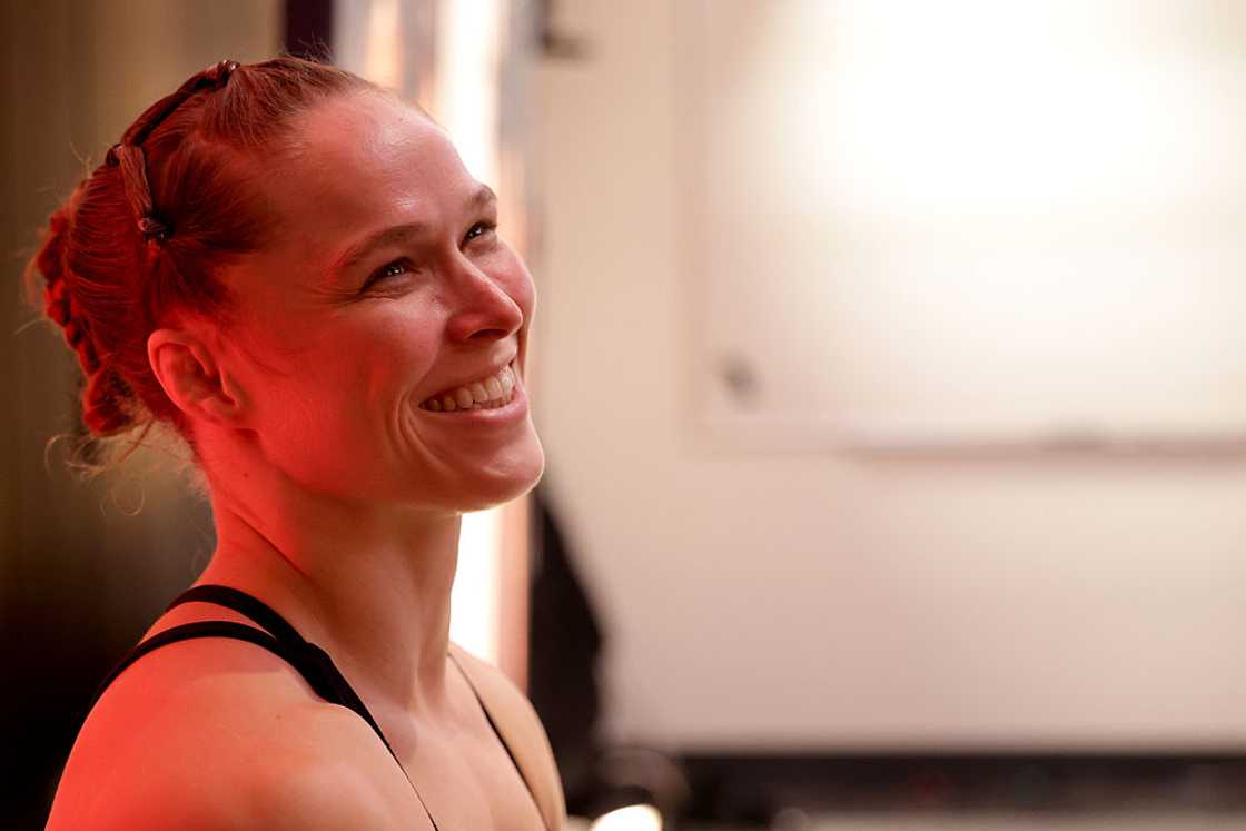 Ronda Rousey smiles following her victory against Gina Carano Ronda Rousey smiles following her victory against Gina Carano