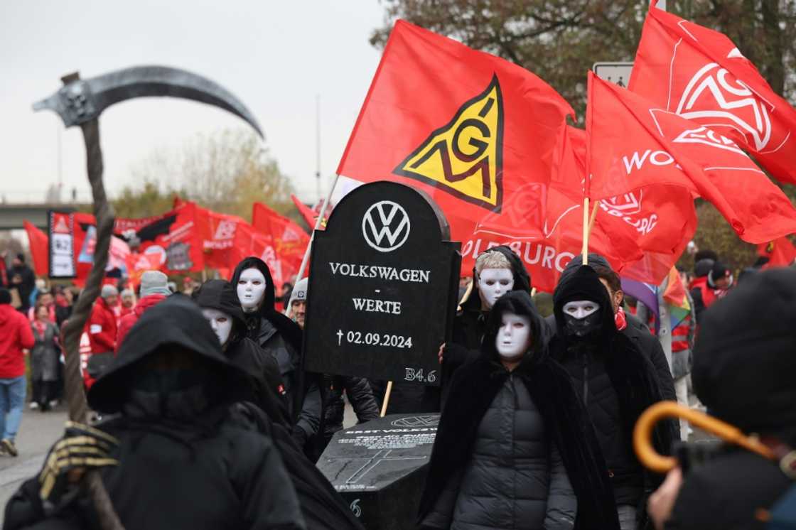 Volkswagen workers staged a colourful protest against planned cost cuts