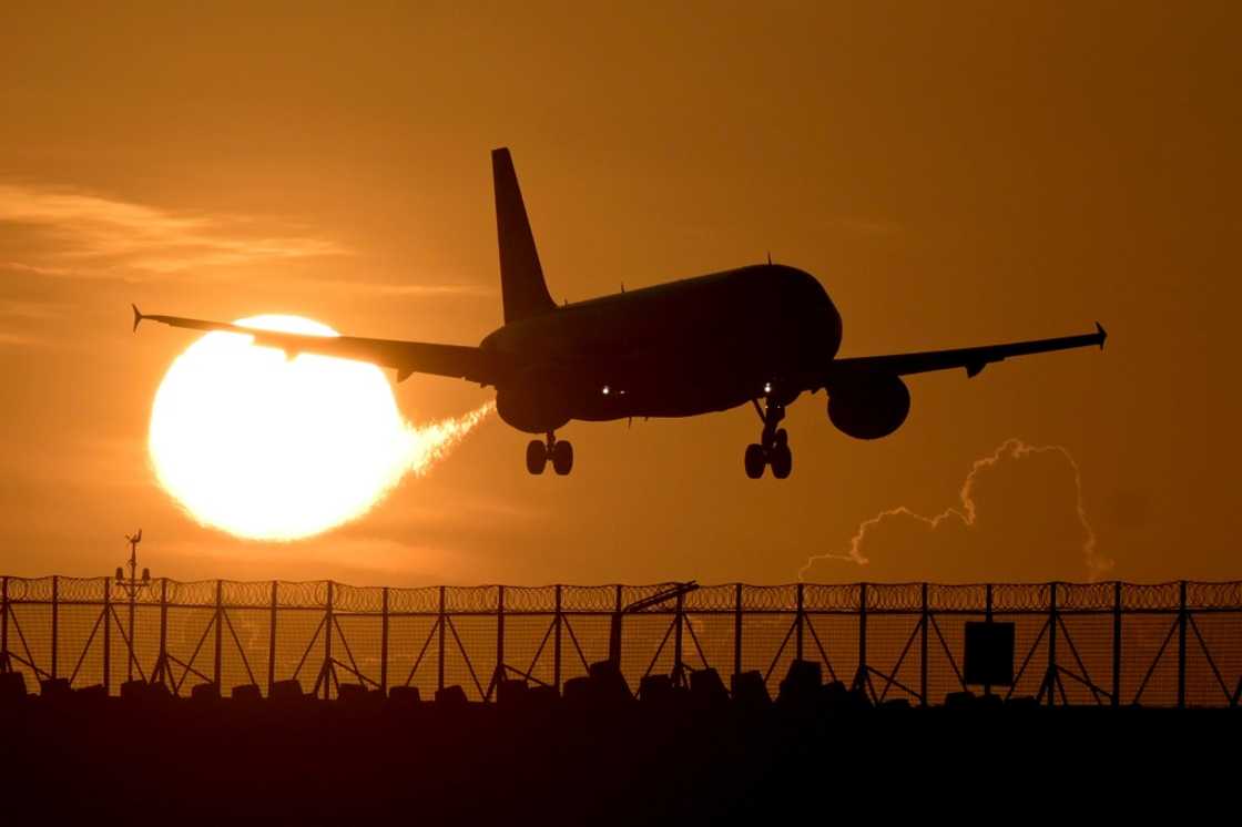 A commercial plane prepares to land at Ngurah Rai international airport in Denpasar, on Indonesia's Bali island A commercial plane prepares to land at Ngurah Rai international airport in Denpasar, on Indonesia's Bali island