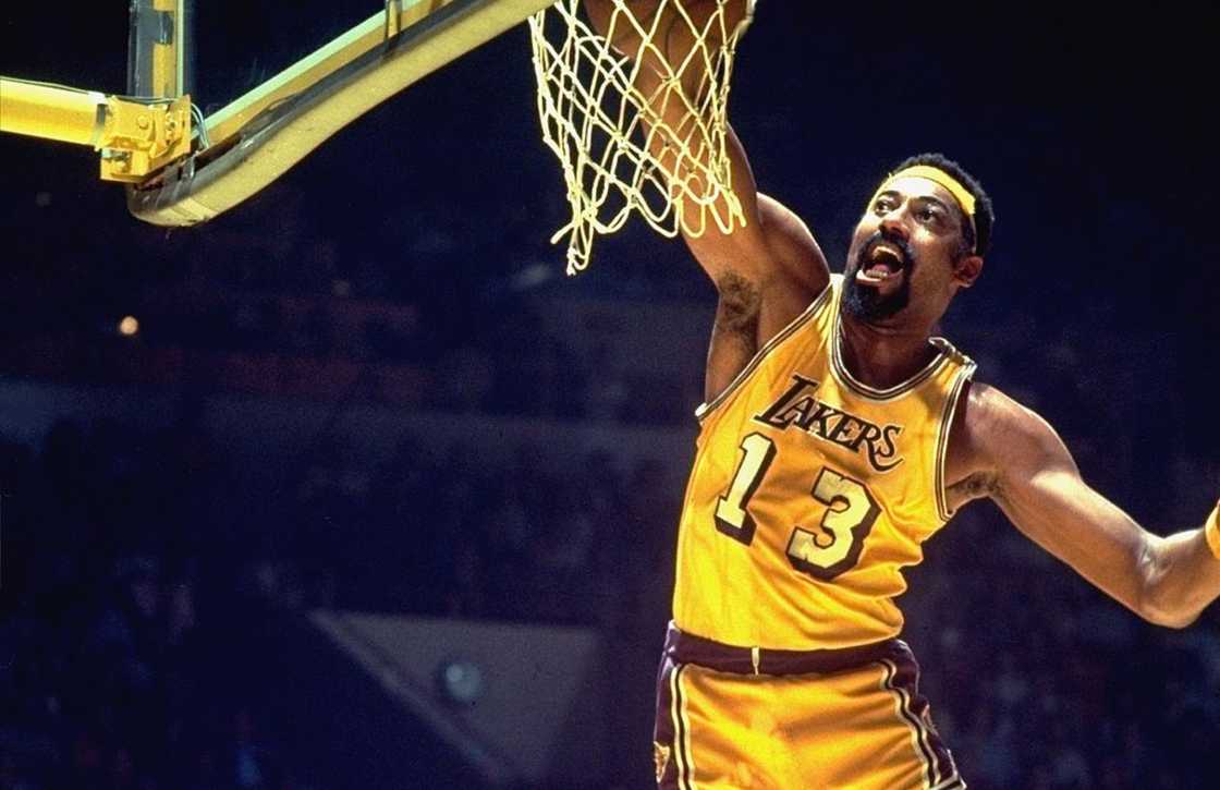 Wilt Chamberlain in action, making a dunk