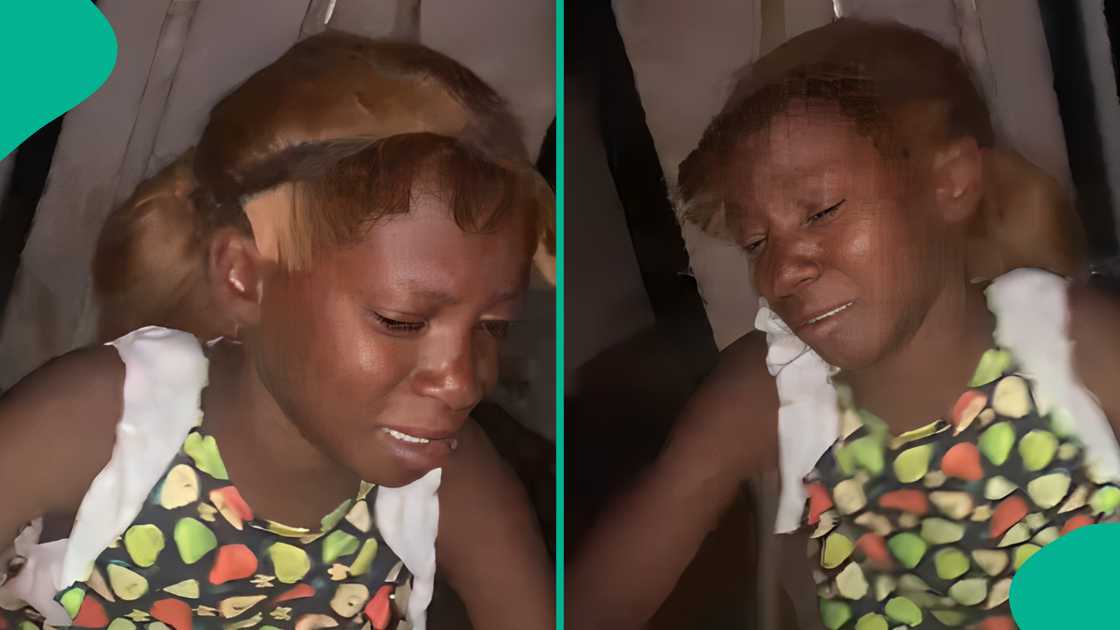 Nigerian girl cries after seeing her Christmas hair in the mirror. Nigerian girl cries after seeing her Christmas hair in the mirror.