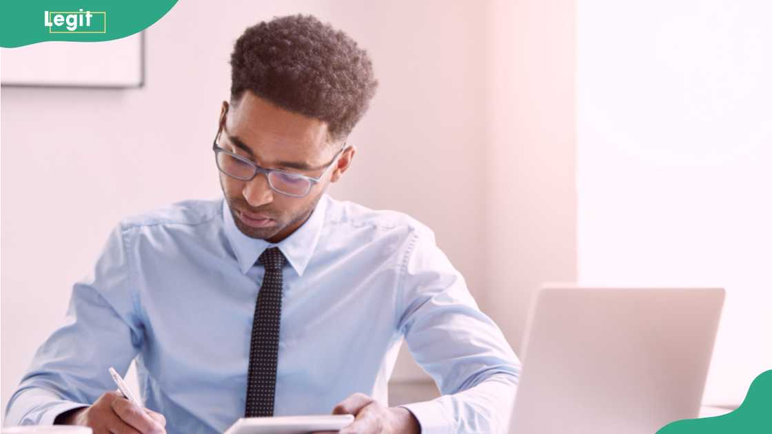 A man at an office desk.