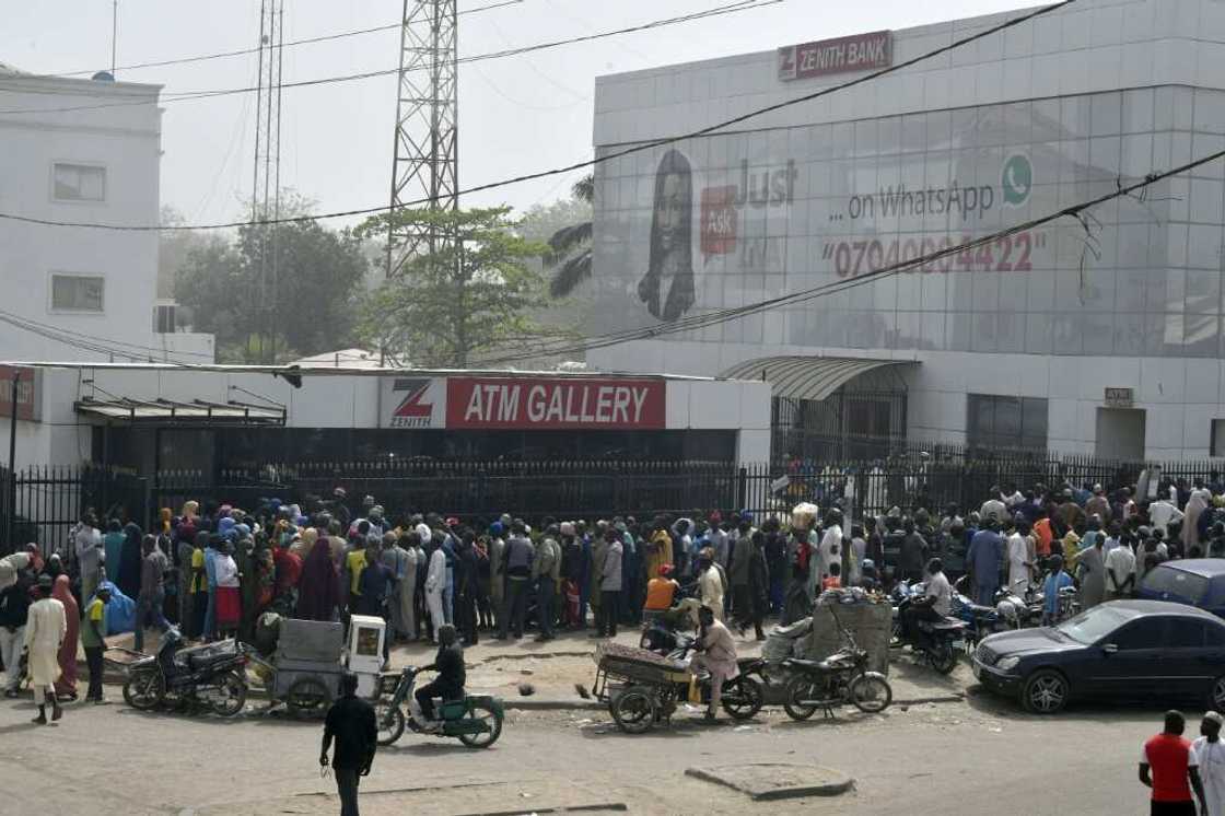 Cash shortages in Nigeria have created long lines outside banks and ATMS as customers try to get their hands on bank notes Cash shortages in Nigeria have created long lines outside banks and ATMS as customers try to get their hands on bank notes