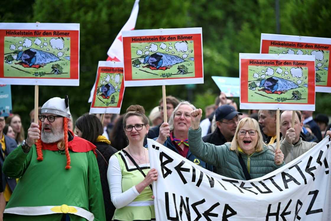 About 200 people protested outside the bank's annual general meeting in Wiesbaden, western Germany About 200 people protested outside the bank's annual general meeting in Wiesbaden, western Germany