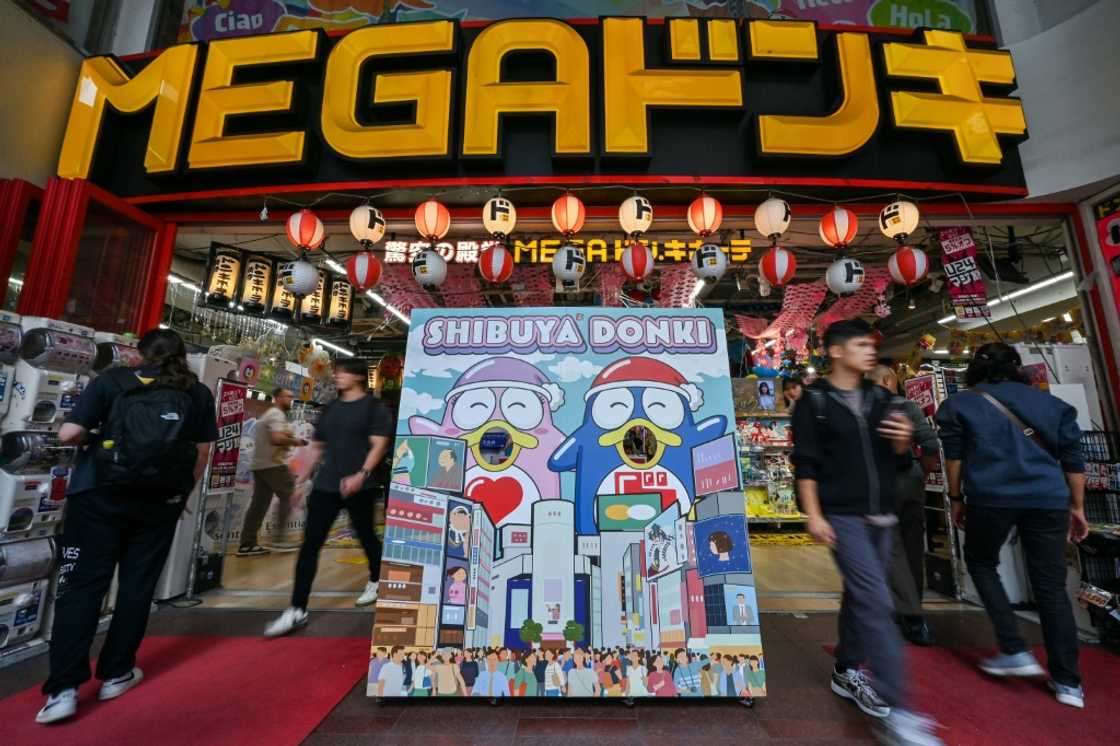 Business is booming at Japanese discount chain Don Quijote, which sells everything from compact gadgets to party costumes, thanks to its cult status among tourists Business is booming at Japanese discount chain Don Quijote, which sells everything from compact gadgets to party costumes, thanks to its cult status among tourists