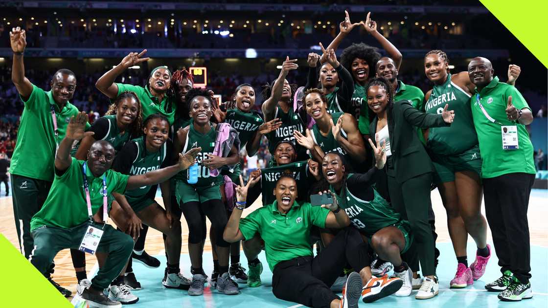 D'Tigress team and crew members celebrate after beating Canada at Paris Olympics. D'Tigress team and crew members celebrate after beating Canada at Paris Olympics.
