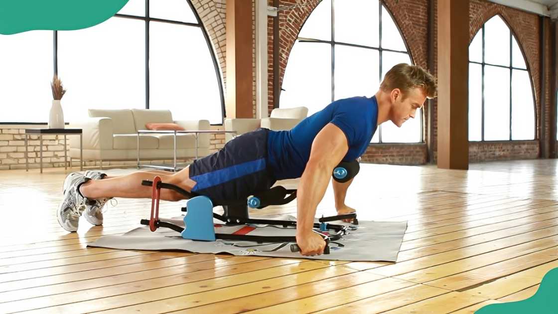 A man demonstrating the Body Jac push-up assistance device. A man demonstrating the Body Jac push-up assistance device.