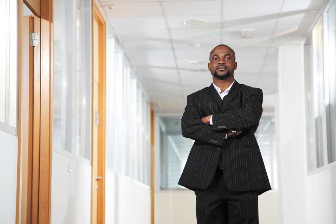 A man standing in the hallway A man standing in the hallway