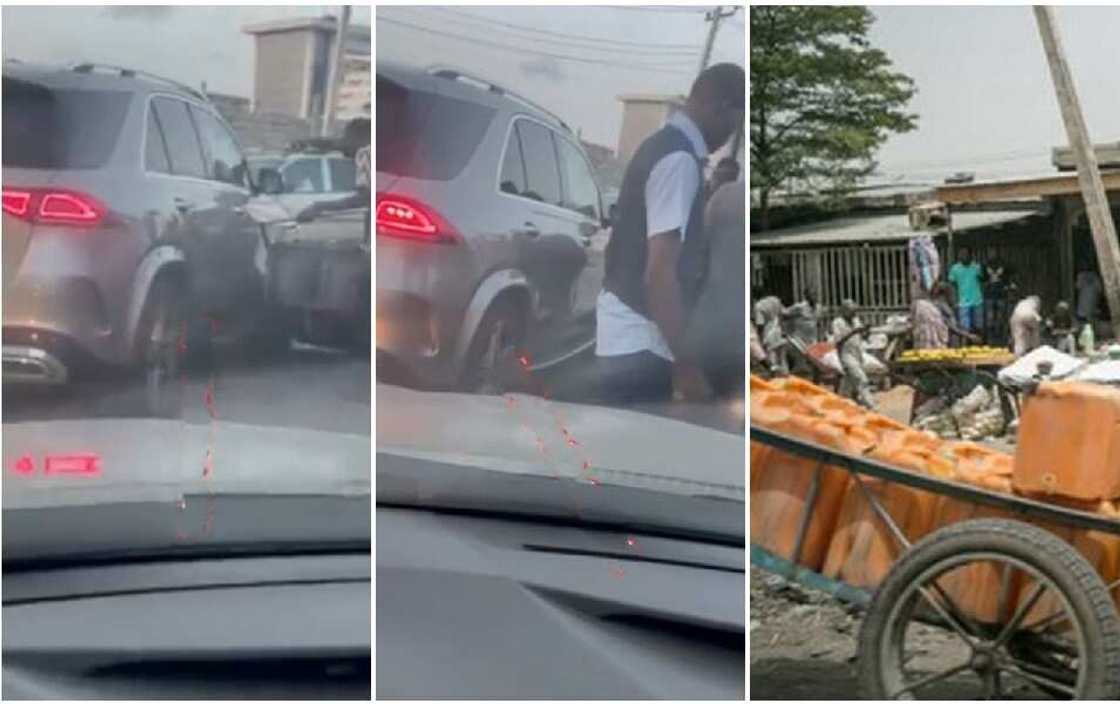 Lagos truck pusher scratches an expensive Mercedes Benz. Lagos truck pusher scratches an expensive Mercedes Benz.