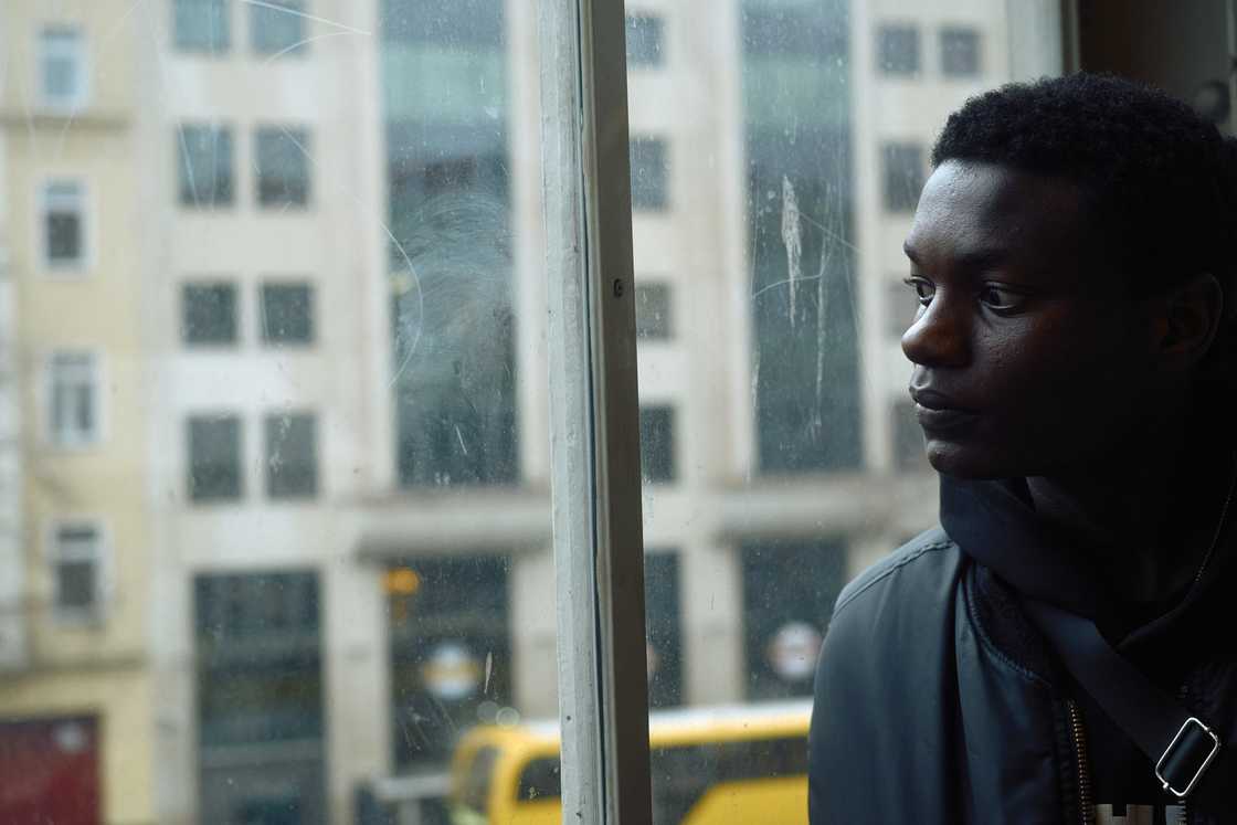 A thoughtful man in a bus