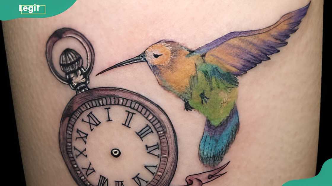 Hummingbird and clock tattoo