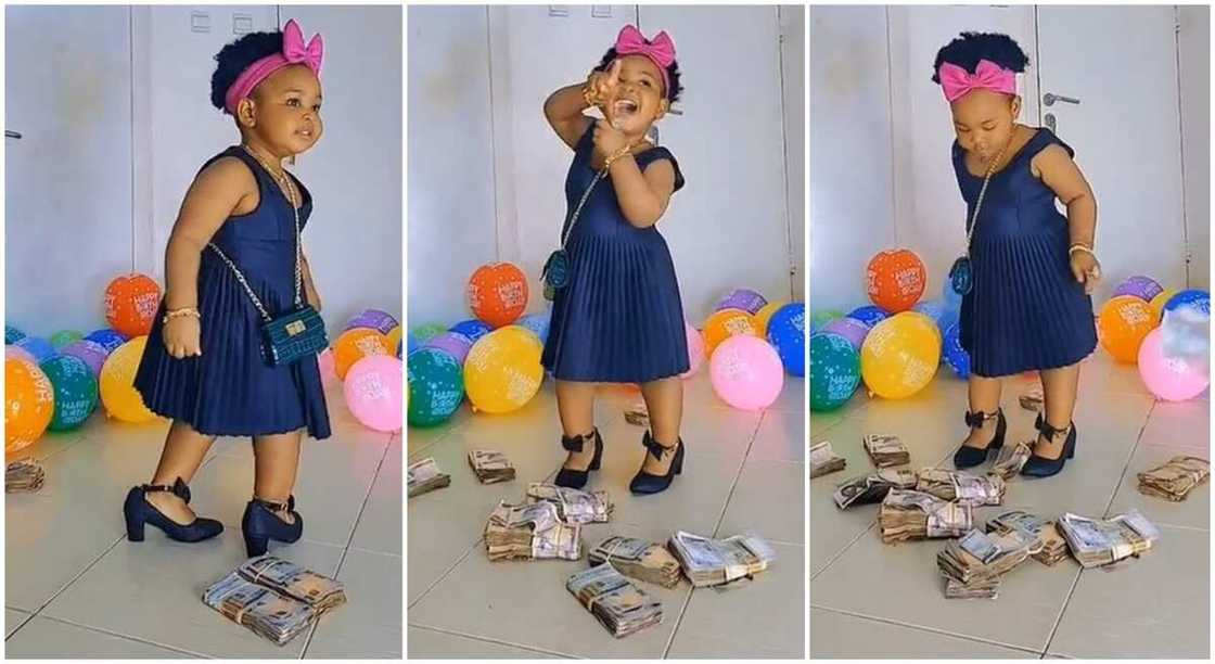 Photos of little Nigerian girl dancing as she is gifted bundles of cash. Photos of little Nigerian girl dancing as she is gifted bundles of cash.
