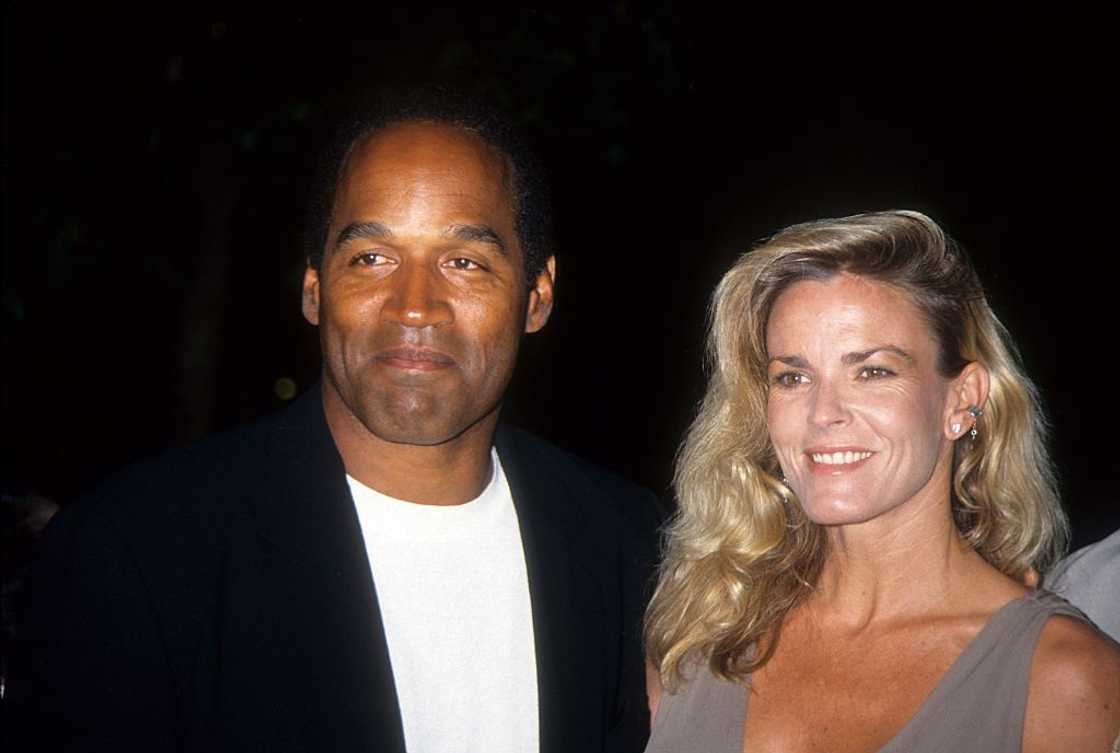 O.J. Simpson and Nicole Brown Simpson at the Naked Gun 33 1/3 premiere in Los Angeles.