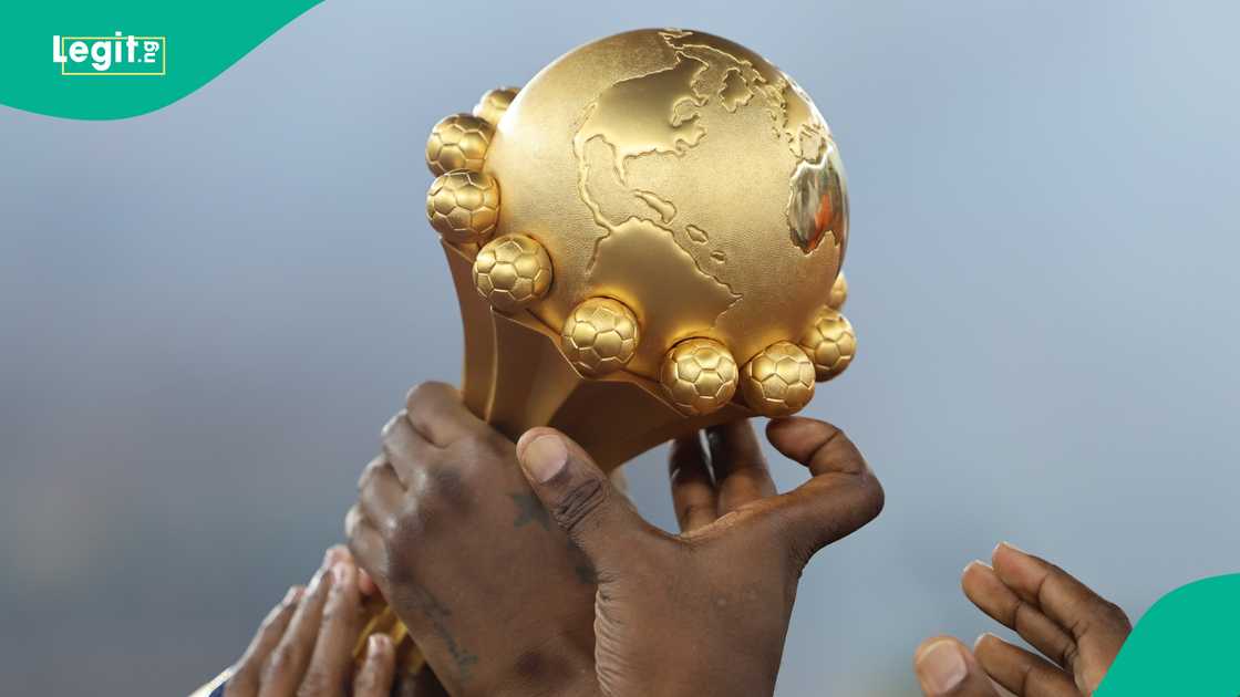 An Algerian fan switches to the Nigerian team during the AFCON live match. An Algerian fan switches to the Nigerian team during the AFCON live match.