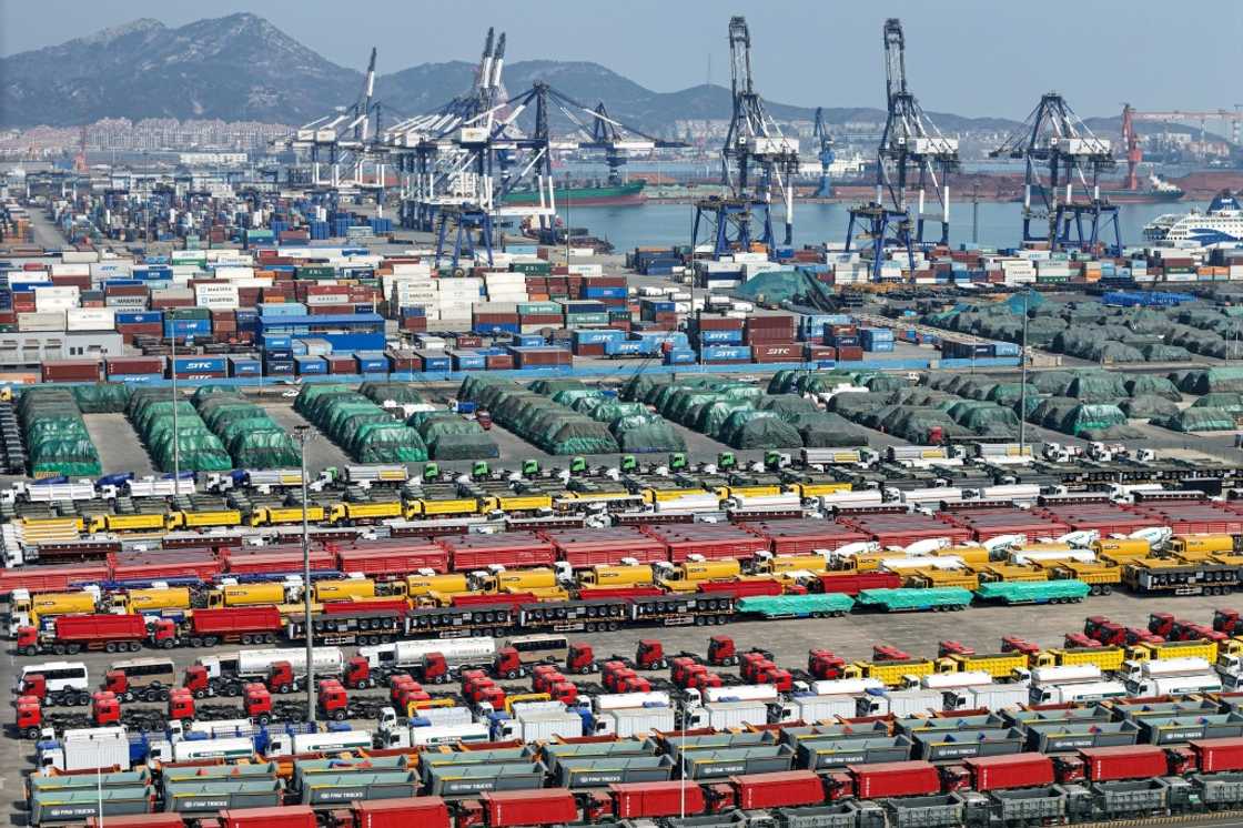 Cars and other vehicles for export are seen at a port in Yantai, in eastern China's Shandong province, on April 3, 2025 Cars and other vehicles for export are seen at a port in Yantai, in eastern China's Shandong province, on April 3, 2025