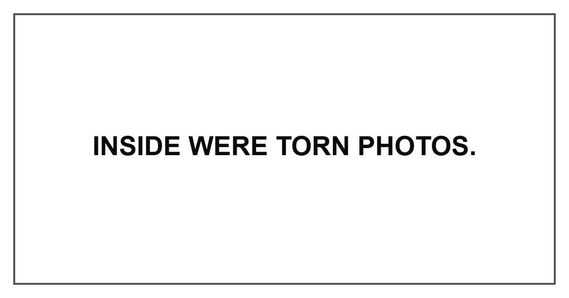 Inside were torn photos. Inside were torn photos.