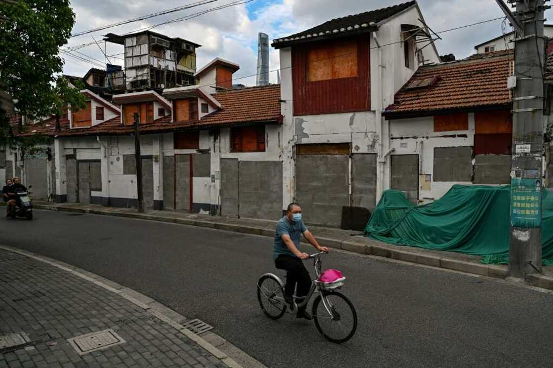 The Laoximen neighbourhood, one of Shanghai's oldest, is increasingly dominated by boarded-up doorways as the city pushes forward with renovation plans