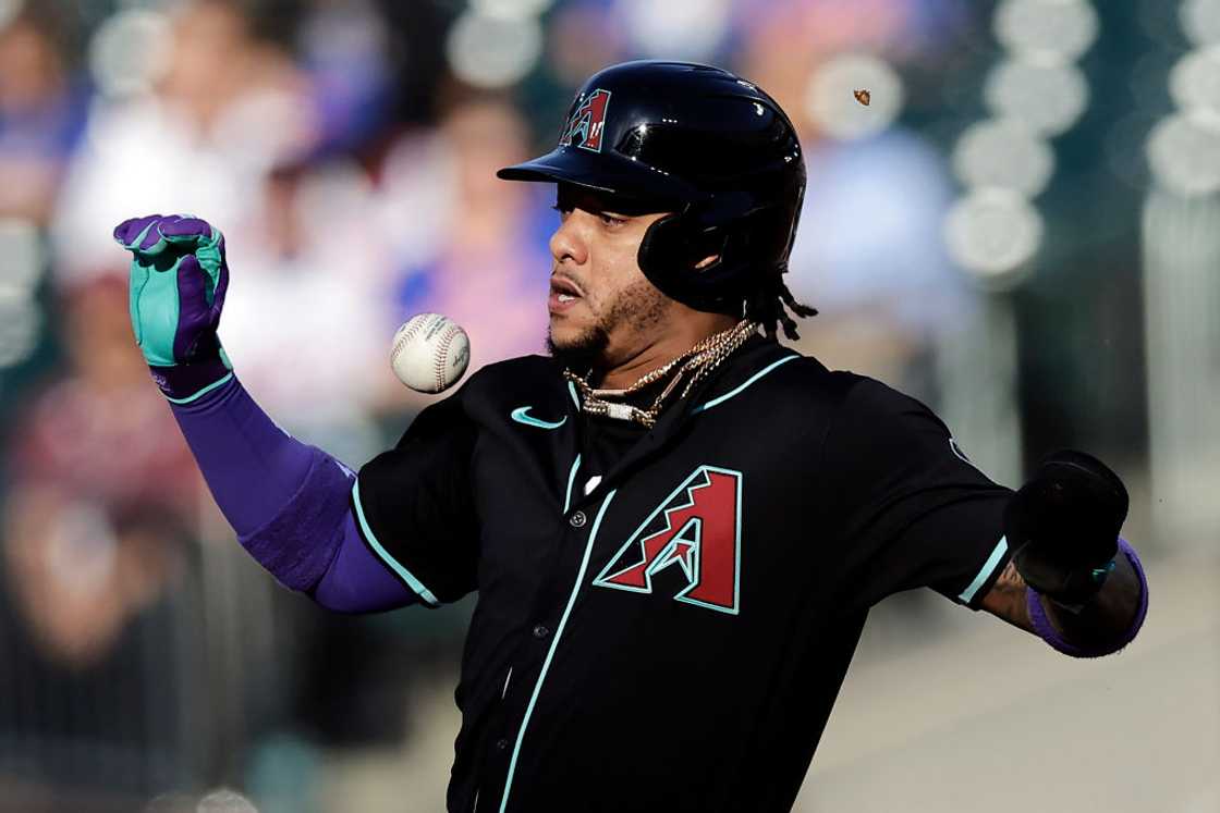 Ketel Marte avoids the ball during a game Ketel Marte avoids the ball during a game