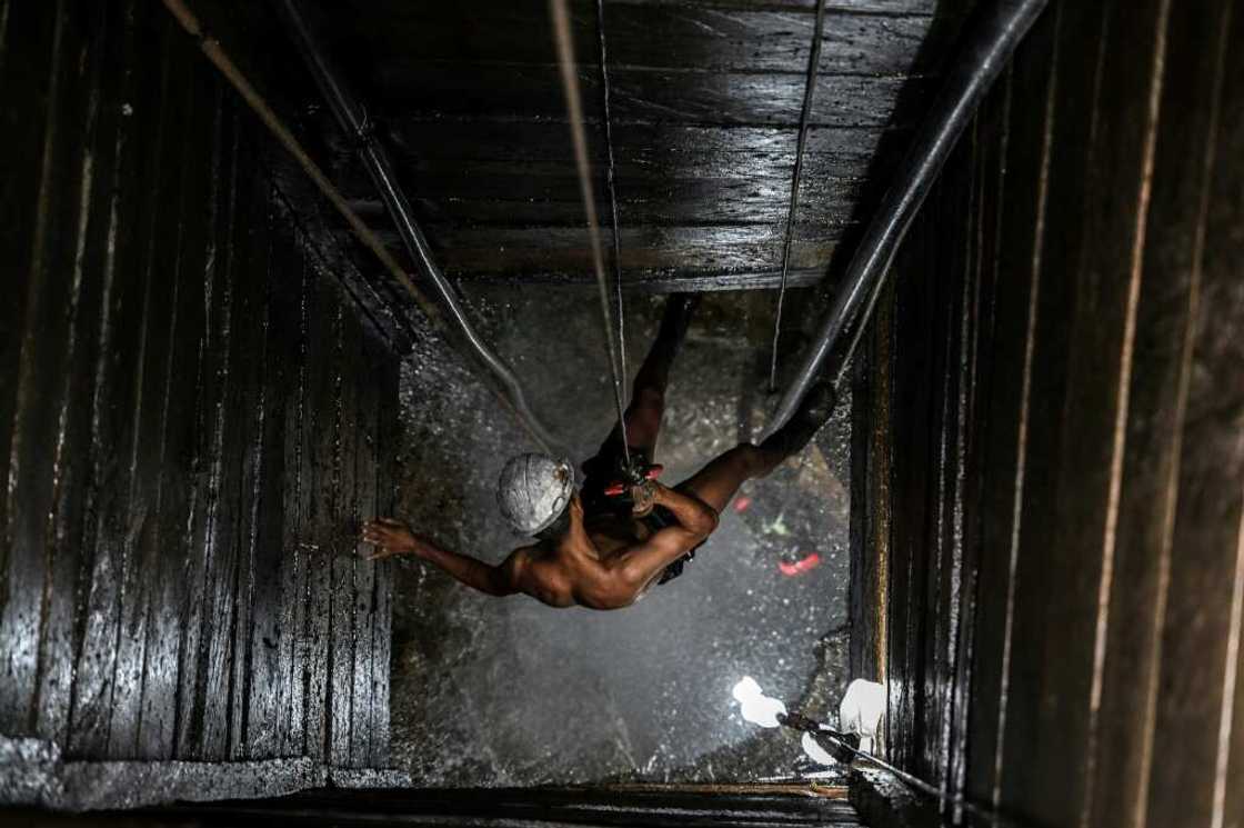 A miner works at an illegal copper mine in Canaa dos Carajas, Brazil, in April A miner works at an illegal copper mine in Canaa dos Carajas, Brazil, in April