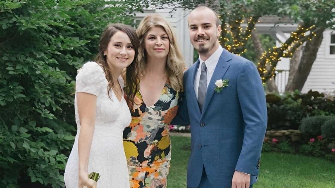 Kirstie Alley (C) poses with Sara Parker (L) and William True Stevenson (R) during their wedding.