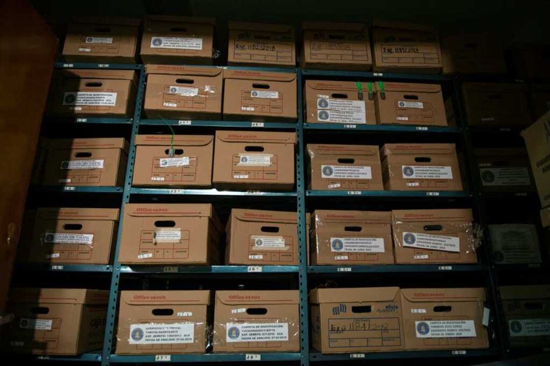 Boxes containing human bones are stored at the forensic services in Chilpancingo in southern Mexico Boxes containing human bones are stored at the forensic services in Chilpancingo in southern Mexico