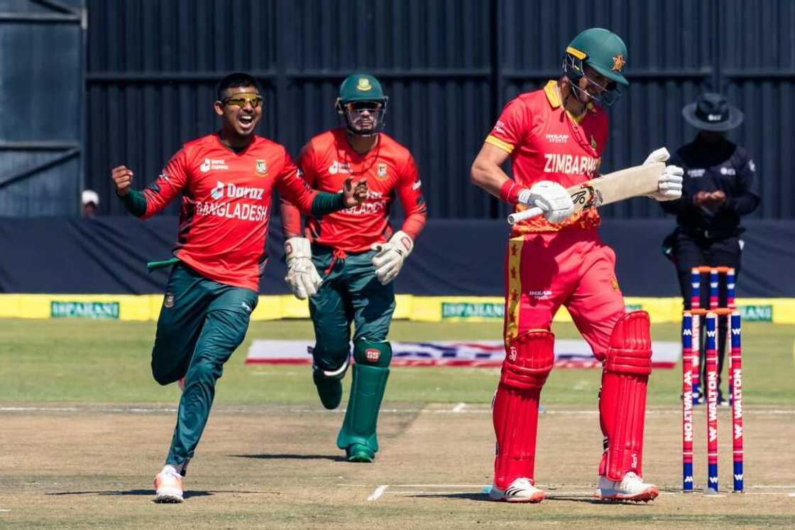 Bangladesh bowler Mosaddek Hossain (L) celebrates taking the wicket of Zimbabwe captain Craig Ervine (R) during the second Twenty20 cricket international at Harare Sports Club on July 31, 2022. Bangladesh bowler Mosaddek Hossain (L) celebrates taking the wicket of Zimbabwe captain Craig Ervine (R) during the second Twenty20 cricket international at Harare Sports Club on July 31, 2022.