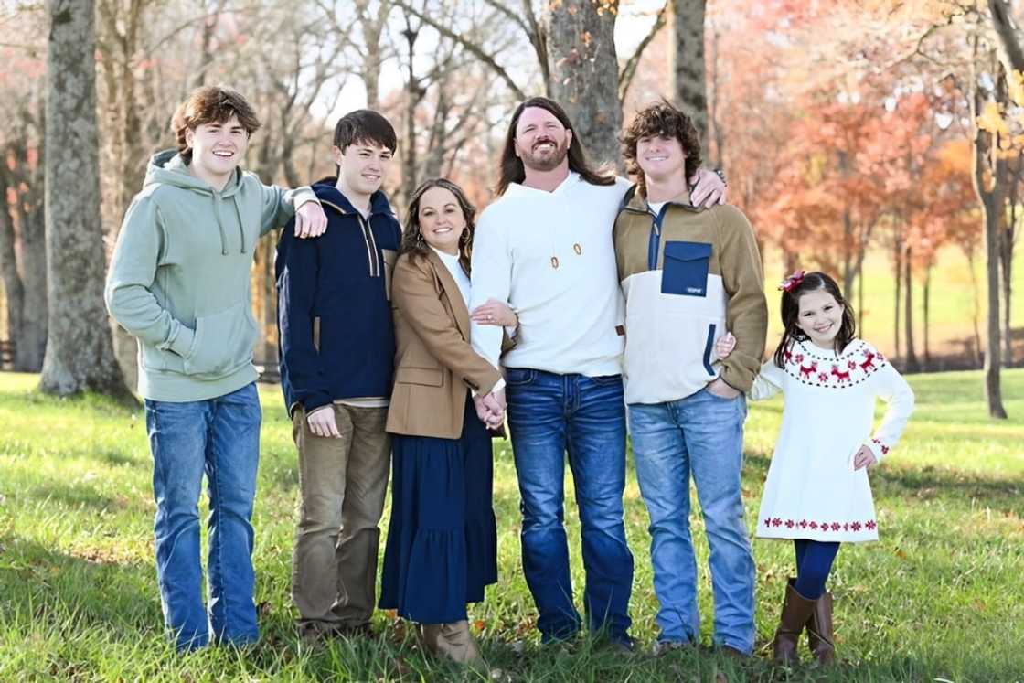 AJ Styles poses with his wife Wendy and their children.