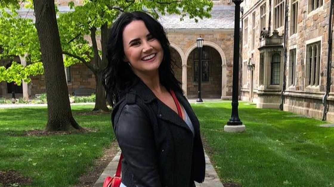 Sydney Brooke Simpson poses standing outdoors. Sydney Brooke Simpson poses standing outdoors.